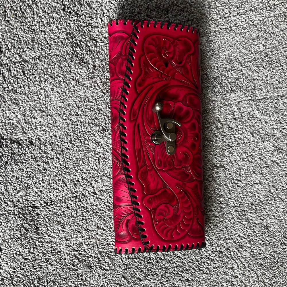 Juan Antonio Red Embossed Leather clutch purse.  Like new condition!